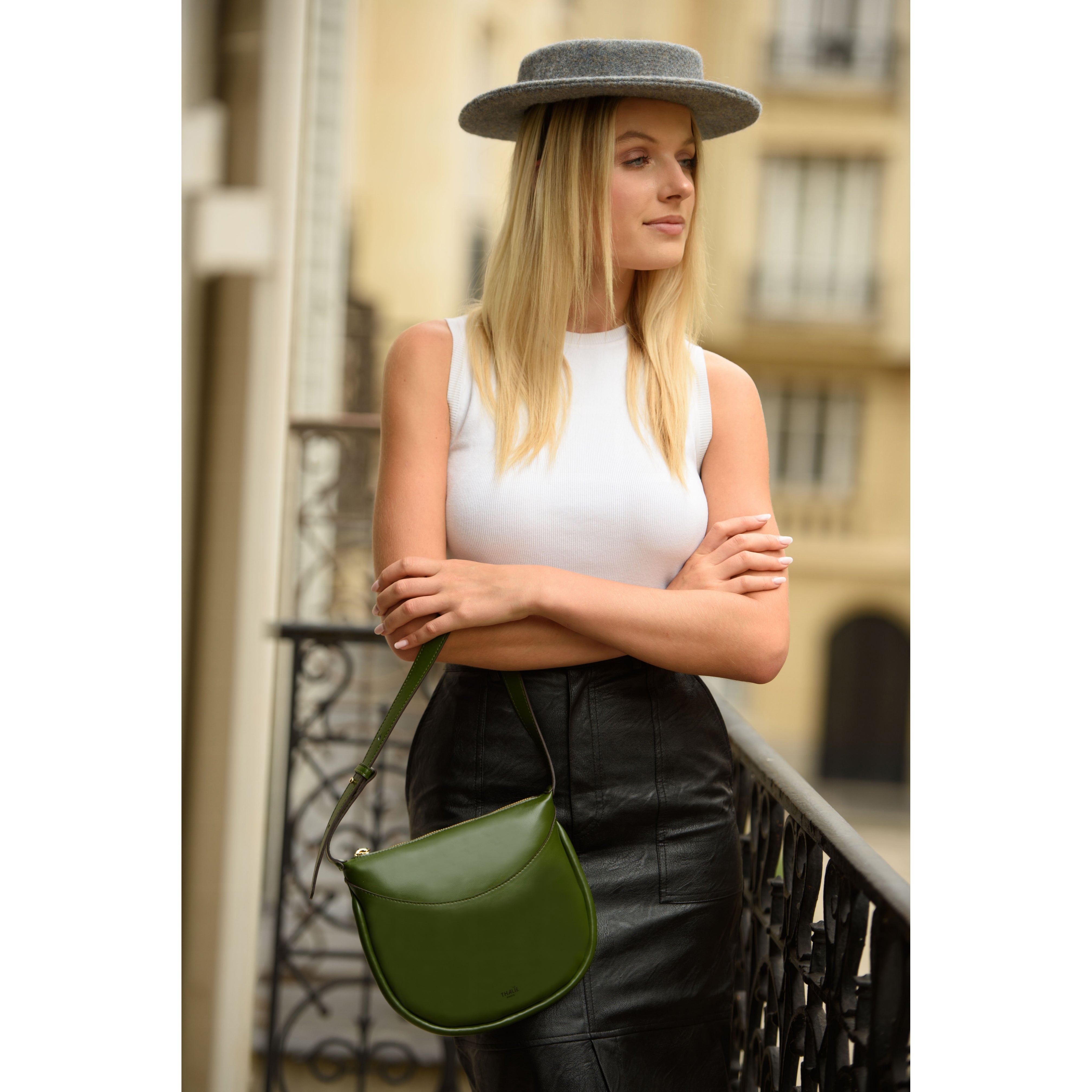 Model wearing Adele Green Vegan Shoulder Bag – Effortlessly stylish and sustainable, perfect for casual wear and evening outings. Thalie Paris