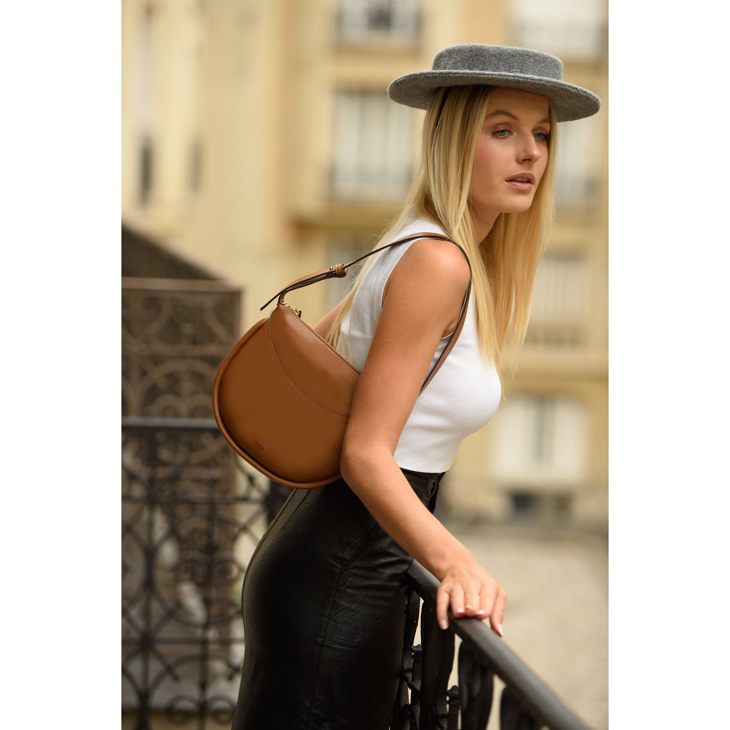 Model wearing Adele Tan Vegan Shoulder Bag – Eco-friendly fashion for every season, adding elegance and sustainability to any outfit.