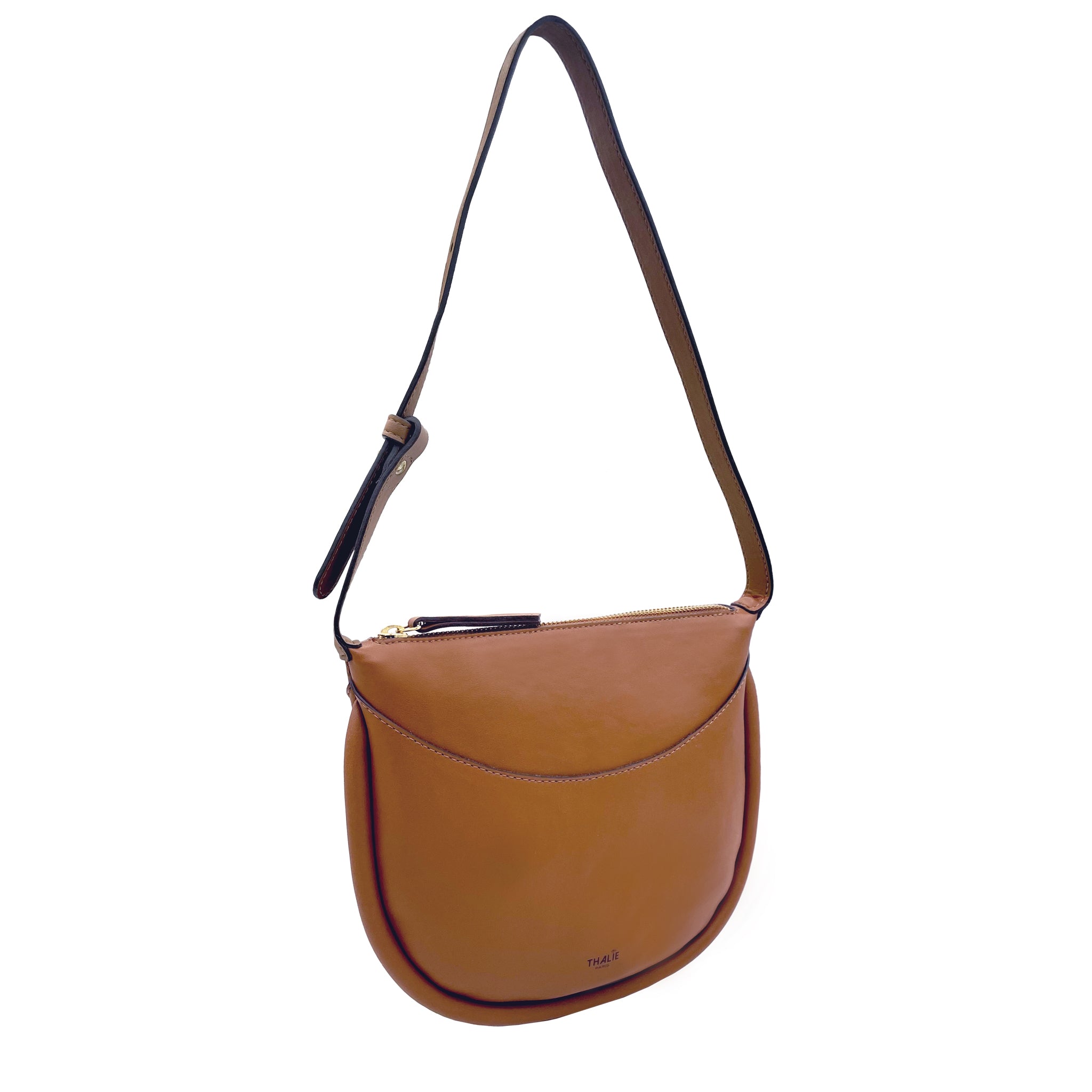 Side view of Adele Tan Vegan Shoulder Bag. Classic tan color with spacious interior, perfect for daily essentials and crafted from PETA-approved cactus leather.
