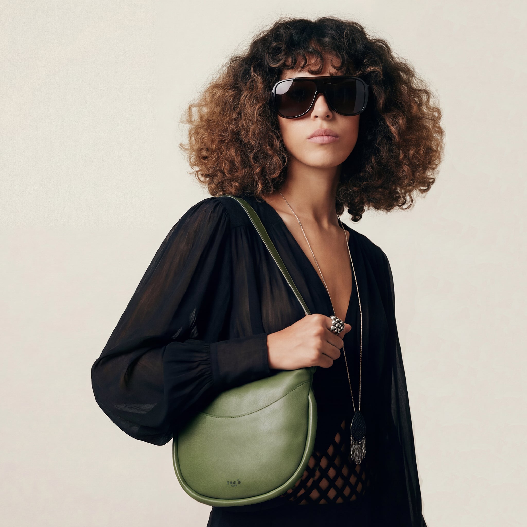 Adele shoulder bag crafted from green vegan cactus leather, embodying modern Parisian elegance by Thalie Paris