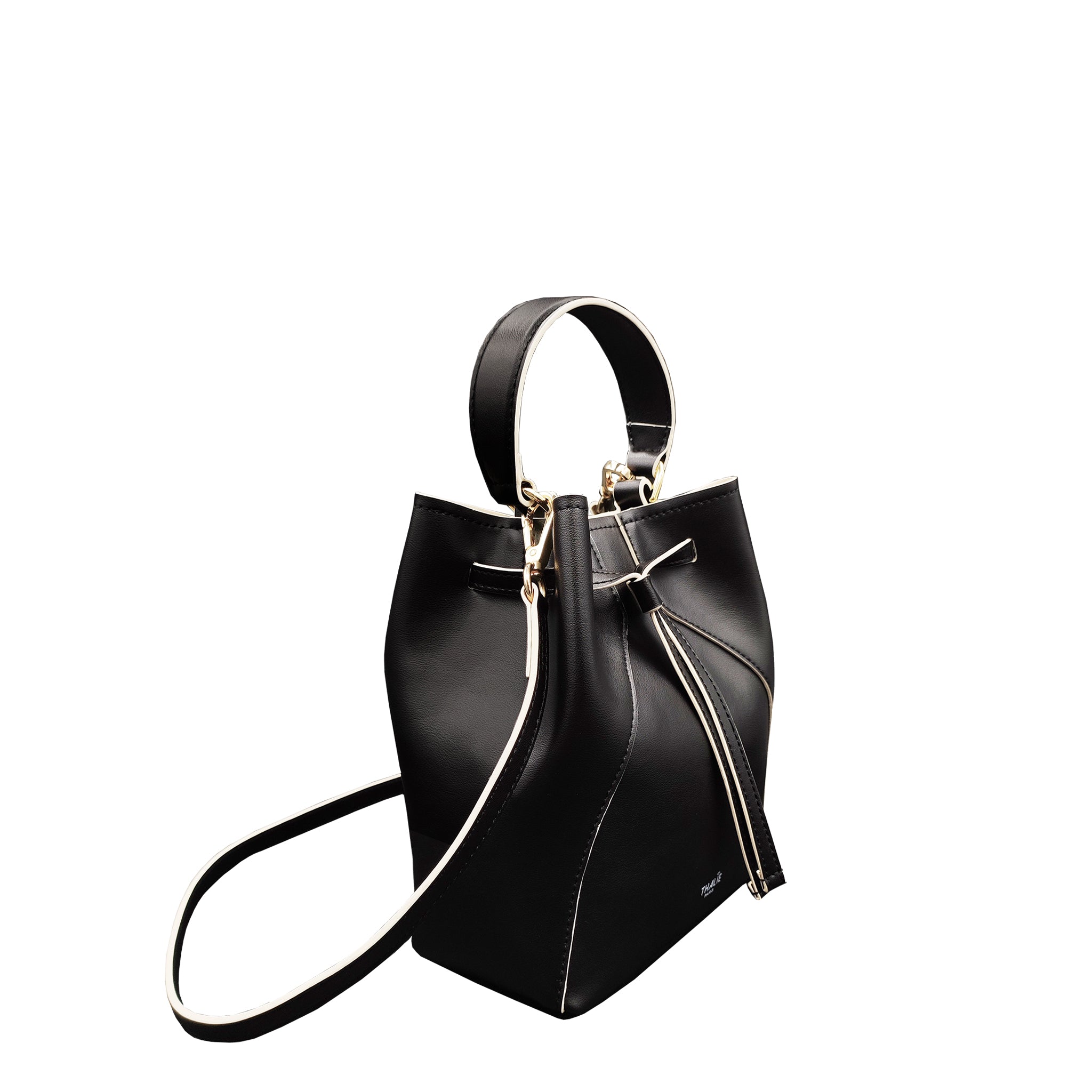 Side View: Sleek and modern Mia Black Bucket Bag an ethical handbag choice. Thalie Paris