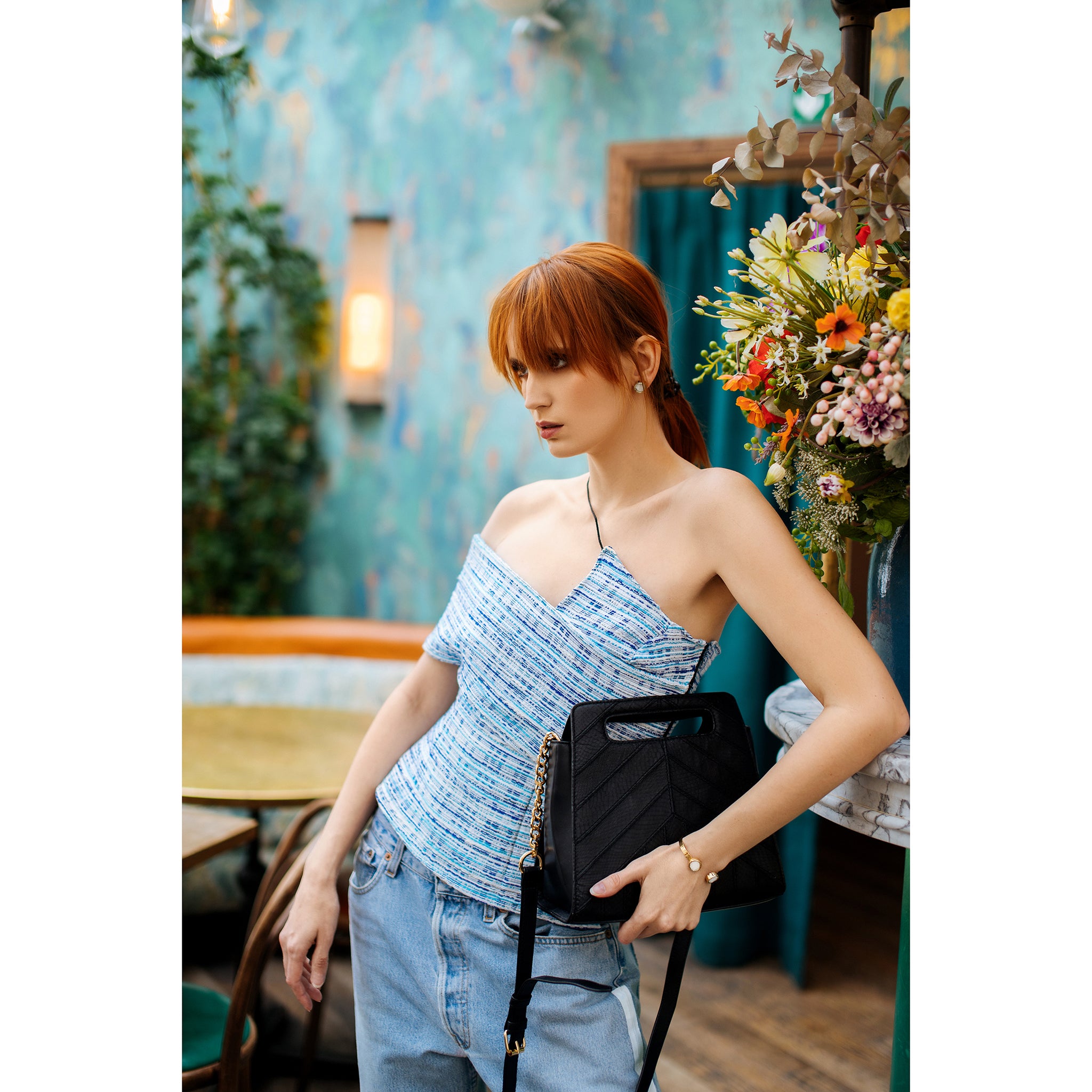Raphaelle black sustainable marine salmon leather lifestyle view.