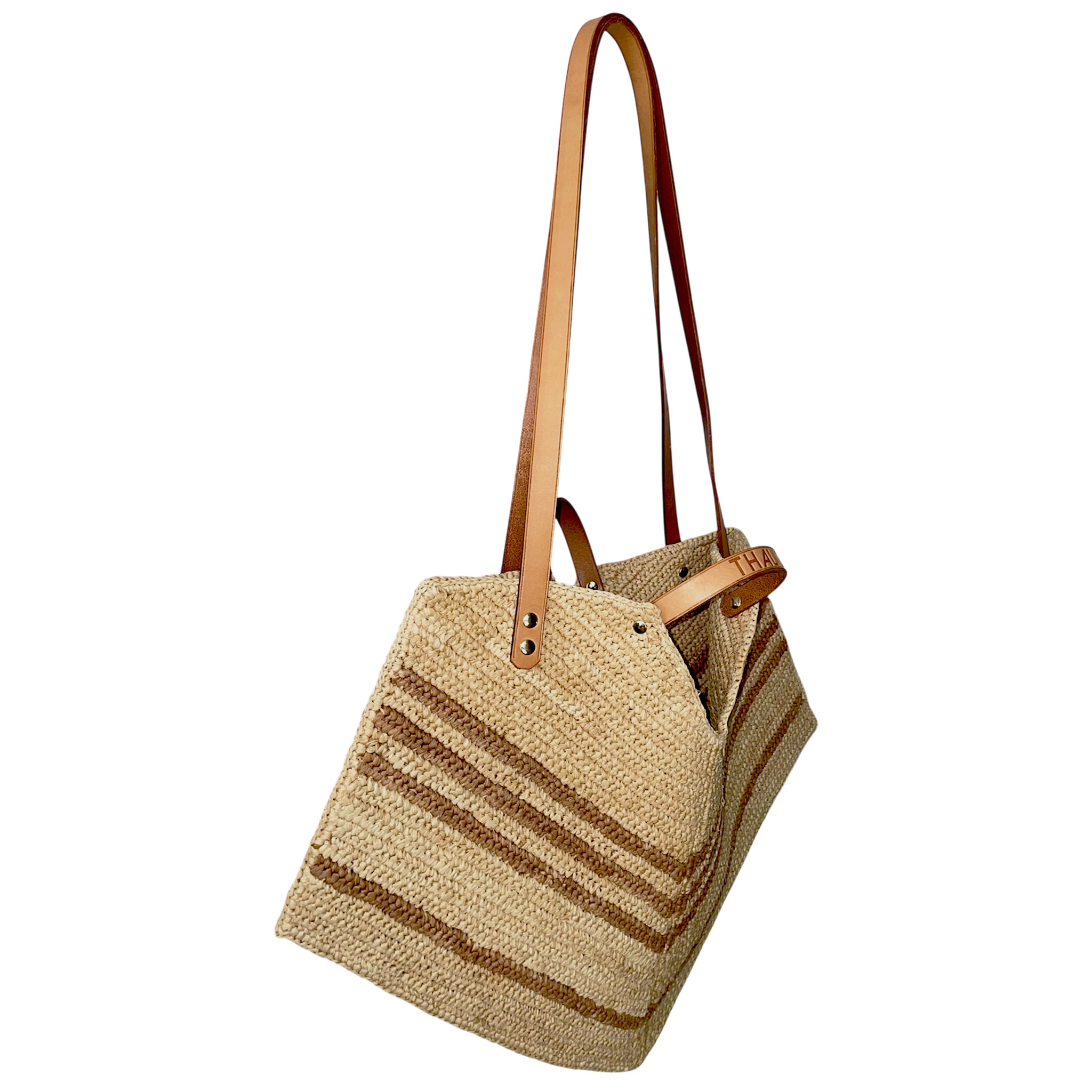 Luxury tan raffia and leather tote bag for summer, made in France.